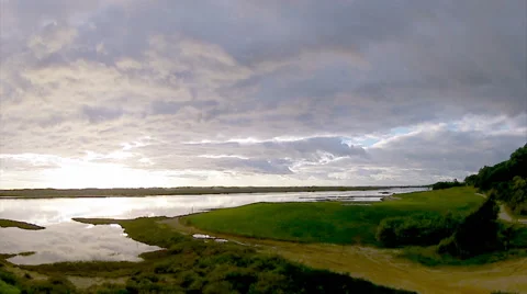 Algarve QDL cloudscape Sunset Pan Timelapse A Stock Footage 46419724