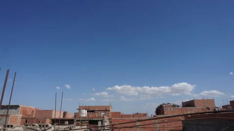 Algeria Timelapse of clouds moving on a blue sky on a town Stock Footage 139932619