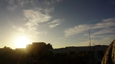 Algeria Timelapse of sunset and clouds moving on a little town Stock Footage 139934333