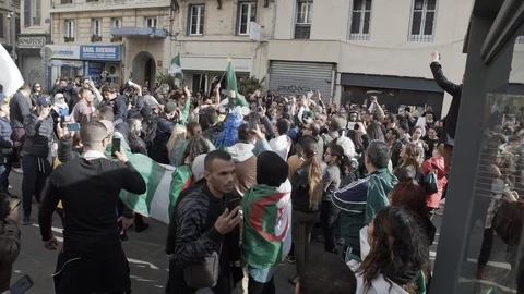 Algerian demonstrators play drums, protest against president Bouteflika Stock Footage 104775001
