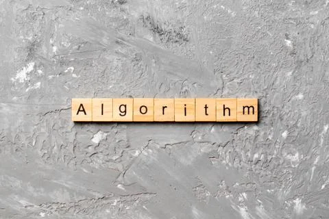 Algorithm word written on wood block. Algorithm text on table, concept 写真素材