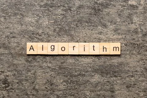 Algorithm word written on wood block. Algorithm text on table, concept Stock Photos