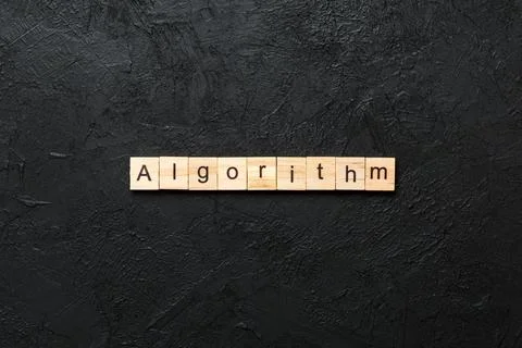 Algorithm word written on wood block. Algorithm text on table, concept Stockfoto's