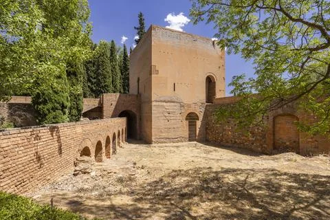 Alhambra complex tower and brick wall in Granada, Spain Stock Photos
