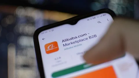 alibaba app download. man download app o... | Stock Video | Pond5