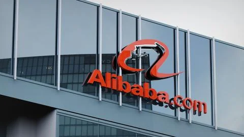 Alibaba Stock data presented on the logo of the office facade editorial Stock Photos