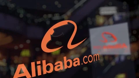 Alibaba.com logo on the glass against blurred business center. Editorial 3D Stock Footage
