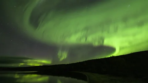 Alien Aurora Borealis over a sandy bay Stock Footage 250294514