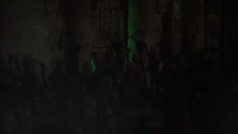 Alien crowd dancing to cosmic rock beats in vibrant concert Stock Footage 294877361