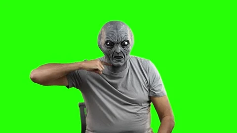 Alien Cut Throat Warning Gesture  	 Stock Footage 318249987