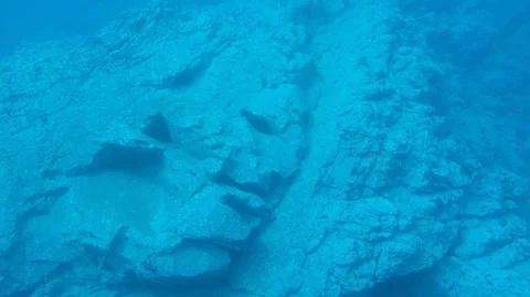 Alien Face in underwater rocks 2.7k 60fps Stock Footage 86144866