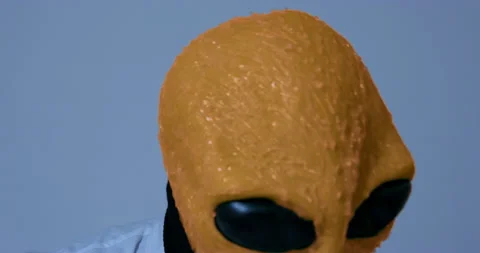 Alien looks making strange moves and suddenly disappears Stock Footage 211789392