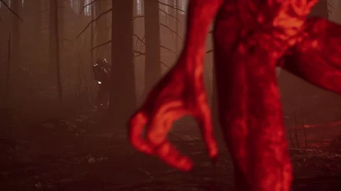 Alien monster stands in the fire and the heroic soldiers corner it 03 Stock Footage 230048988