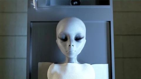 Alien opens eyes in morgue. Autopsy concept. Cinematic 4k footage. Stock Footage 71818978