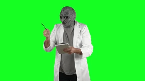 Alien Scientist Taking Notes Stock Footage 319793015