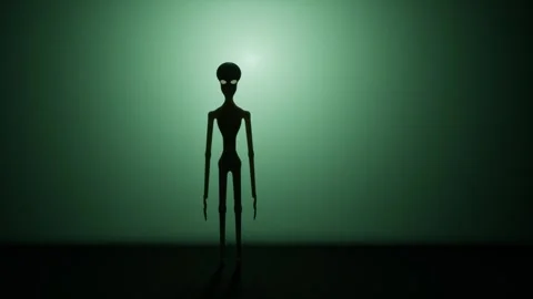 Alien silhouette on mysterious green backdrop. 3d rendering 库存影片 340403589
