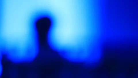 Alien like silhouette of small child Stock Footage 111642177