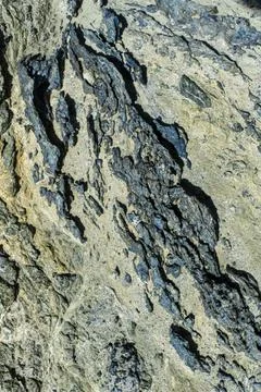 Alien Surface, Black Rocks Protrude Foto stock