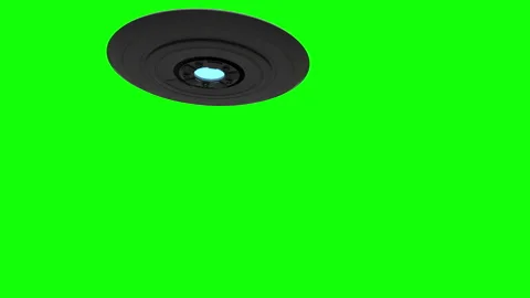 Alien UFO Spaceship on Green Screen Flying By Stock Footage 157060896