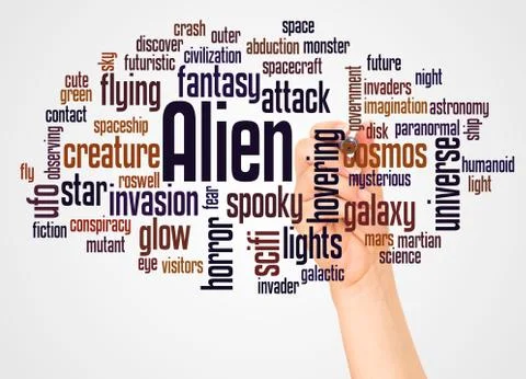 Alien word cloud and hand with marker concept Stock-Fotos