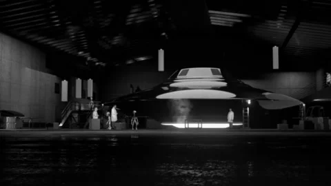 Aliens and Humans Working Together on a Flying Saucer UFO in Hangar Stock Footage 162320003