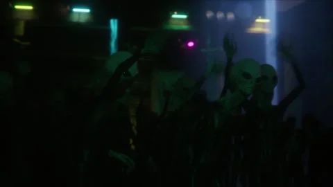 Aliens clapping and moving under dynamic stage effects Stock Footage 294879035