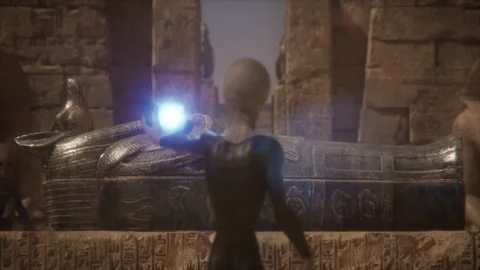 Aliens surround Anubis mummy, using a magical crystal in rituals Video stock 292491584
