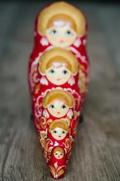 Aligned russian dolls Stock Photos