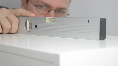 Aligning spirit level Stock Footage 33868061