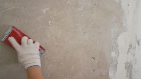 Aligning the walls in front of the wallpaper. Cleaning the walls for painting Stock Footage 158361823