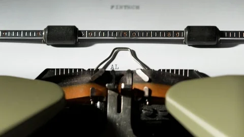 ALIGNMENT and DISRUPTION written on old green vintage retro typewriter Stock Footage 125149479