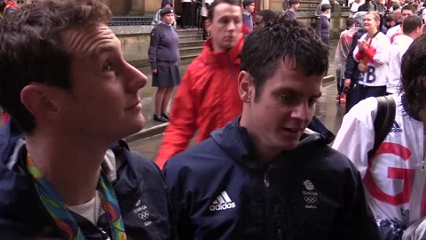 Alistair and Jonathan Brownlee join GB celebration parade - INTs Stock Footage 148728993
