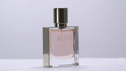Alive Perfume bottle rotation in studio Stock-Footage 171633357