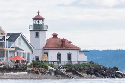 Alki Point Lighthouse on Cloudy Day Stock Photos