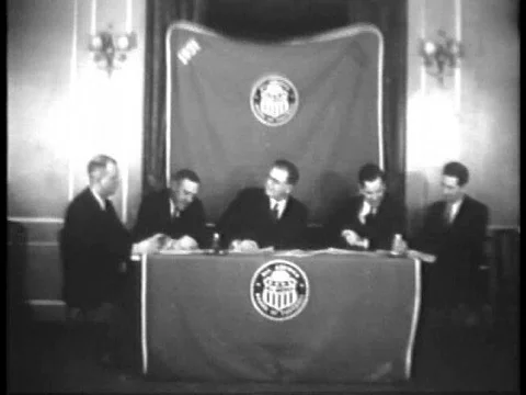The All American Board of Football signs a document and players on the team Stock Footage