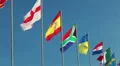 All countries national colors flags waving on flagpoles on blue sky background HD Footage