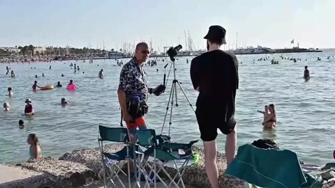 All eyes turn to the sky over Playa de Palma, PALMA DE MALLORCA, ES - 12 Aug 202 Stock Footage 342076638