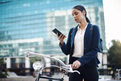 All the functionality to keep an entrepreneur moving. a young businesswoman 写真素材