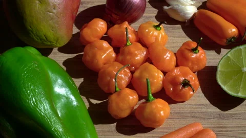 All Ingredients Needed for Making Mango Habanero Hot Sauce. (Slow Motion) Stock Footage 142456997