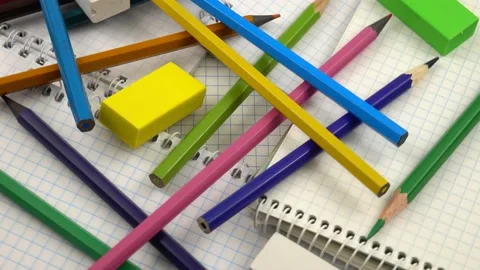 All kinds of colored pencils on notebooks Stock Footage 140520038