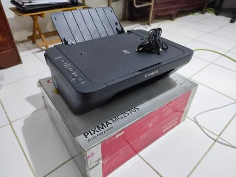 All-in-One Multifunction Inkjet Printer and Scanner Unit on Top of Its Retail Bo Stock Photos