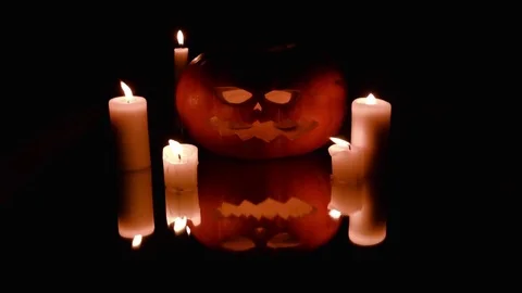 All Saints' Day, Halloween. Pumpkin. Cadles. Mirror. Stock Footage 80974420