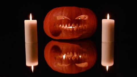 All Saints' Day, Halloween. Pumpkin. Cadles. Mirror. Stock Footage 80979042