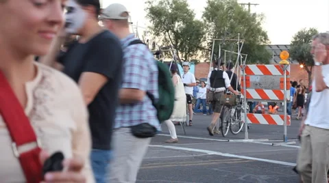 All Souls Procession prep and start - festival - 2 people puppets on strings Stock Footage 919129