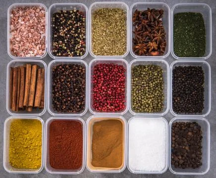 All spices in boxes from above Stock Photos