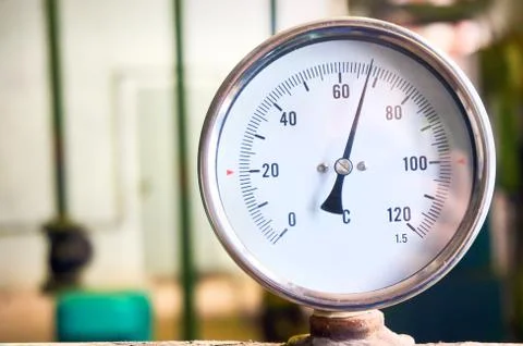 All temperature sensor indicates the temperature of the water pipe. Stock Photos