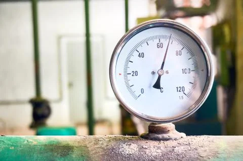 All temperature sensor indicates the temperature of the water pipe. Stock Photos