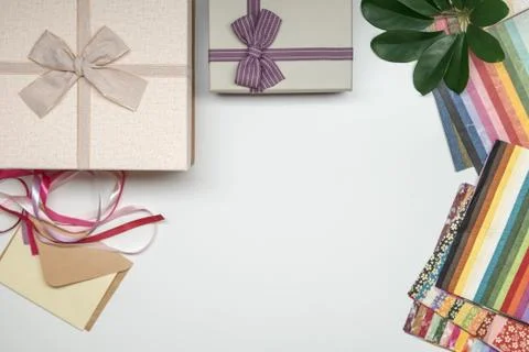 All things for gift wrapping. Present box with bow. Ribbon and color paper. Foto stock