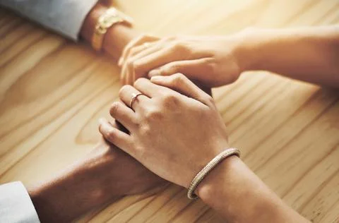 All will be fine in the end. Closeup shot of two women holding hands. Stock Photos