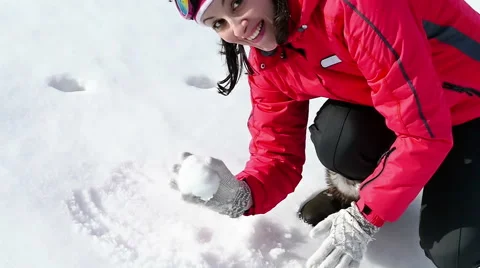 All Winter Magic in Slow Motion-Snowball Fight by a Young Beautiful Woman Stock Footage 60127550